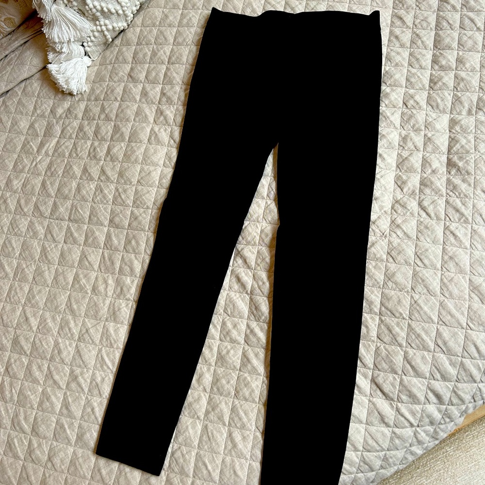 The Row Stretch black denim legging